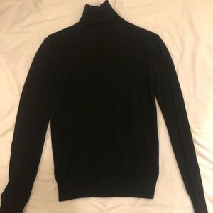 Black long sleeve turtle neck.